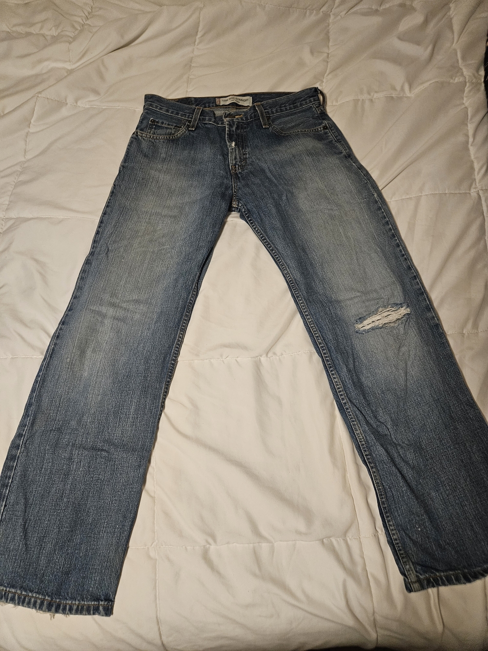 Levi's Men's Blue Low Rise Straight Jeans with Distressed Knee